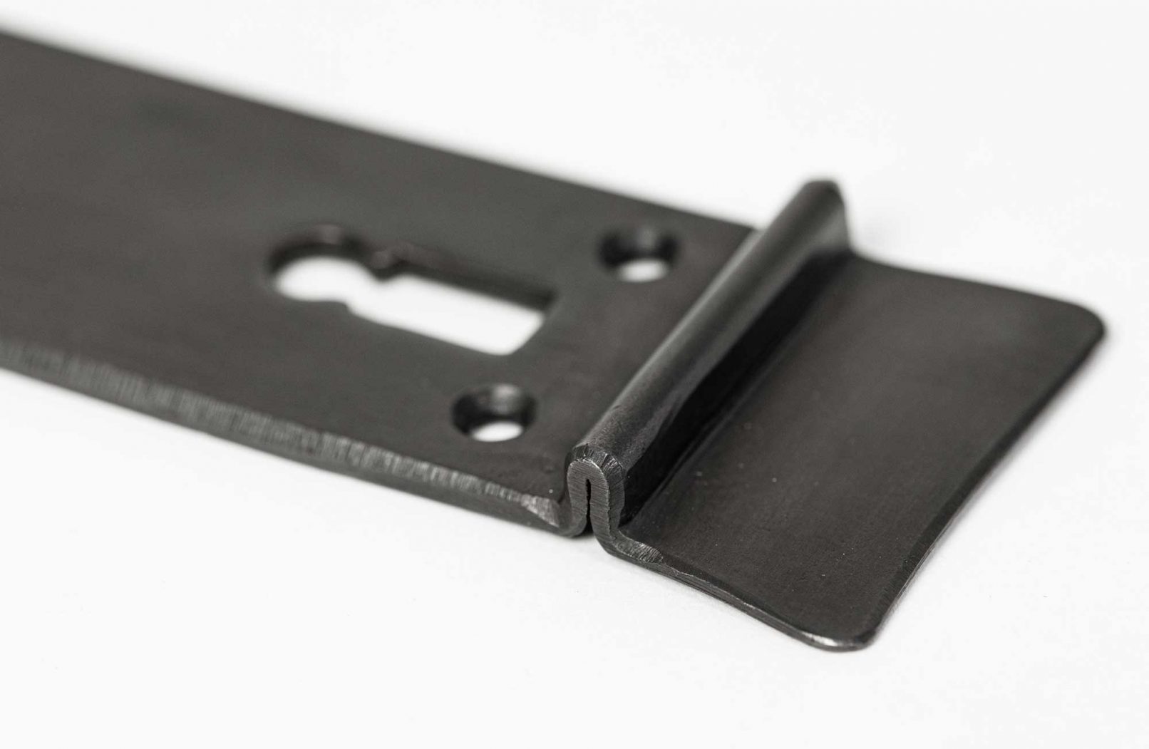 Detail des geschmiedeten Endes des Langschild aus Bronze