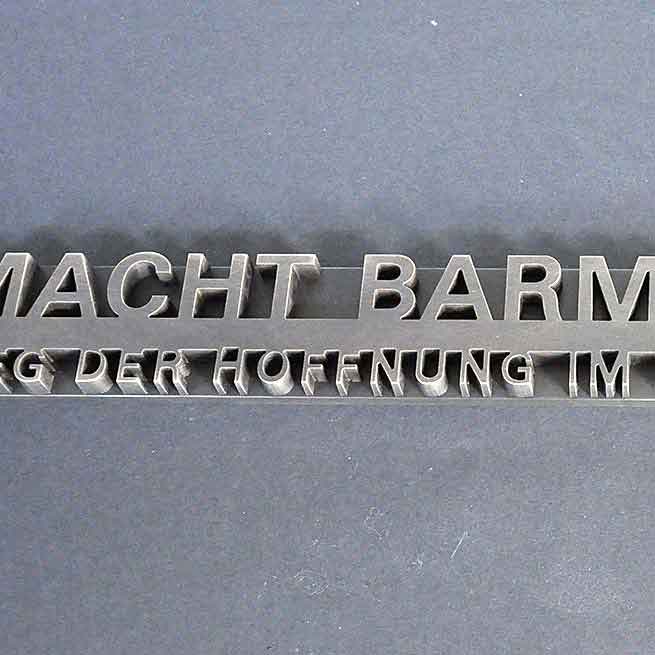 Schriftzug aus Bronze gefräst